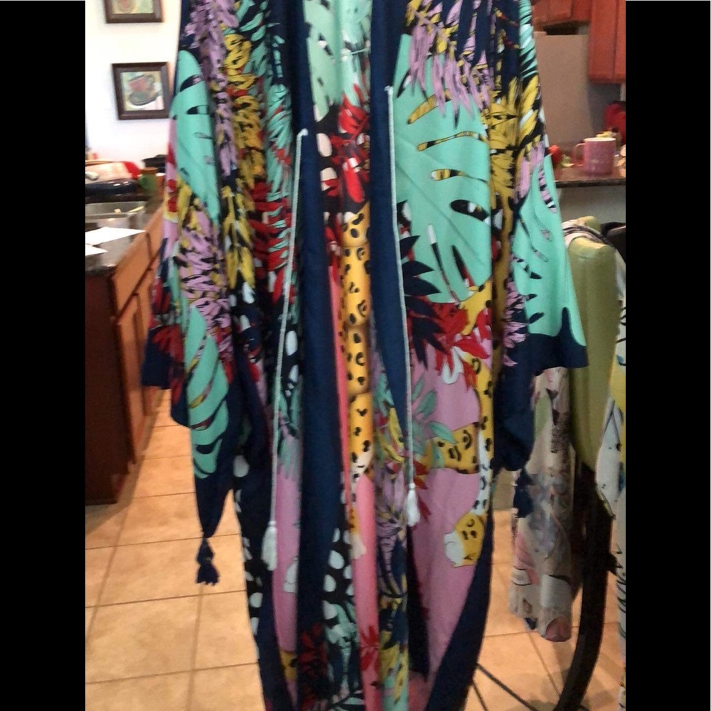 A beautiful falling duster multicolor with tassels